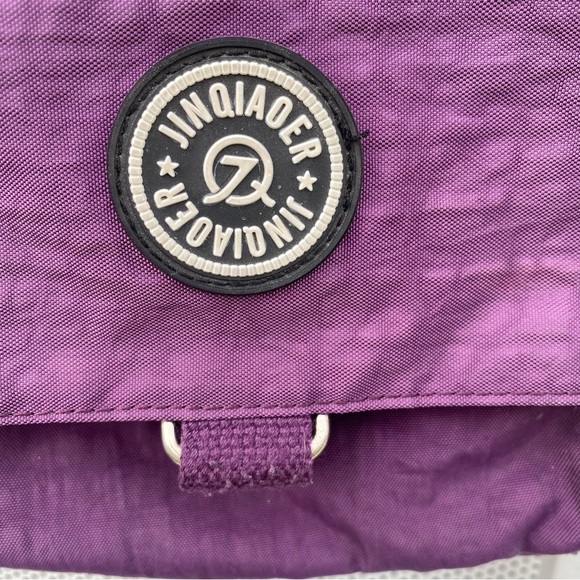 Jinqiaoer Small 8”X8” purple Nylon Crossbody purse. Lots of storage zip pockets - Picture 6 of 6